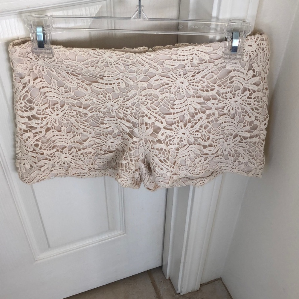 Lace overlay lined ivory shorts
